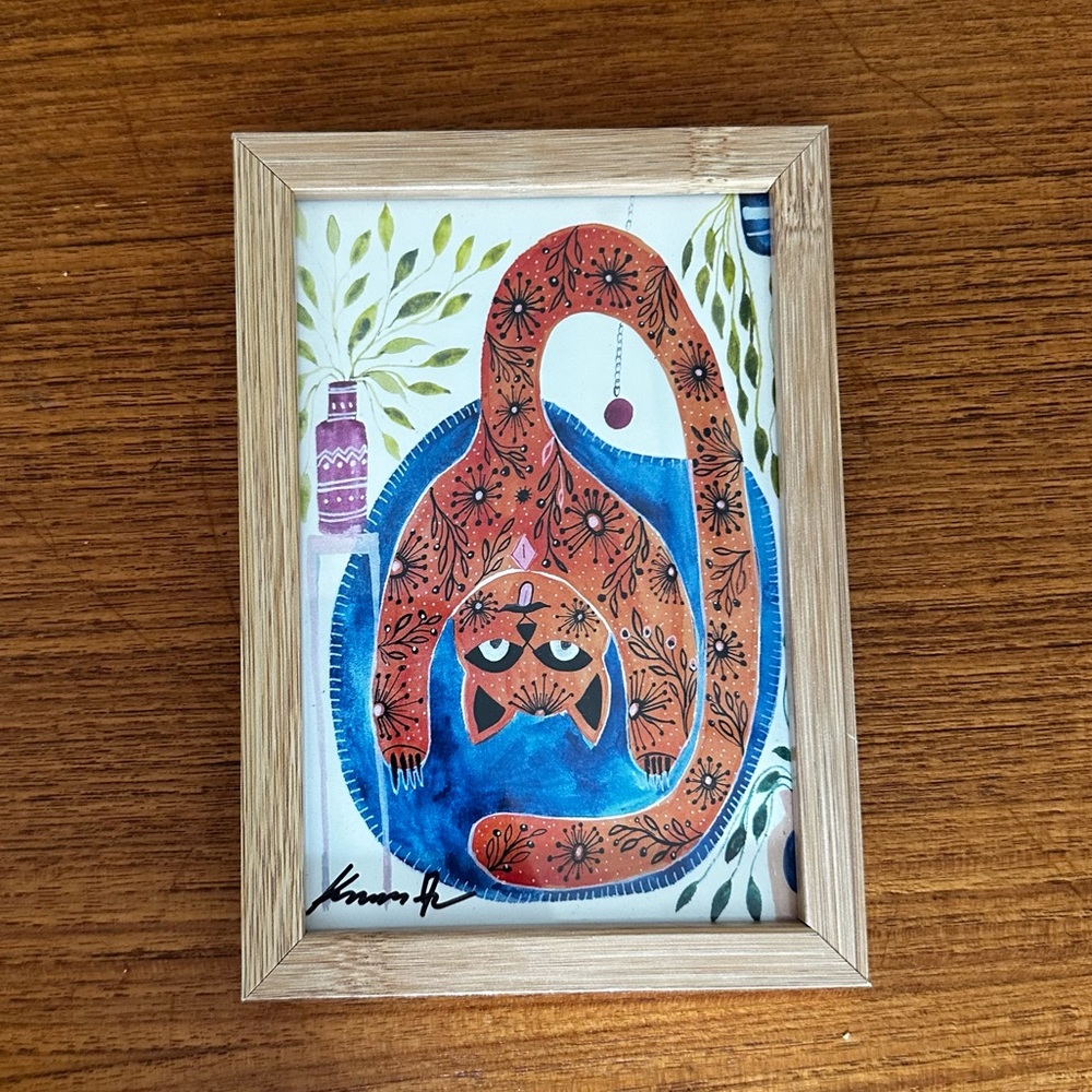 Whimsical cat art print in frame